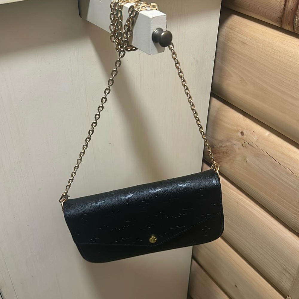 Black small “lv” clutch with chain